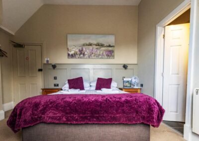 red bedroom in a pub